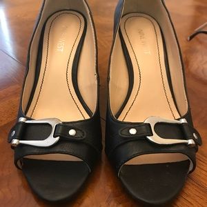 Nine West black wedges size 7. Never worn.